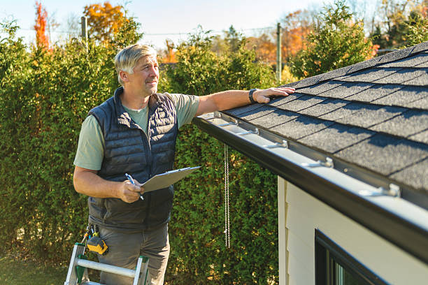 Professional Storm Damage Roof Repair technician working in Burns, WY